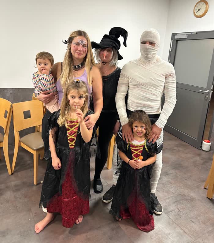 Coaches and kids in costume at the dress up evening of the last edition