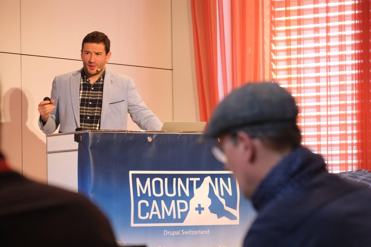 Frederik presenting at the Mountain Camp podium