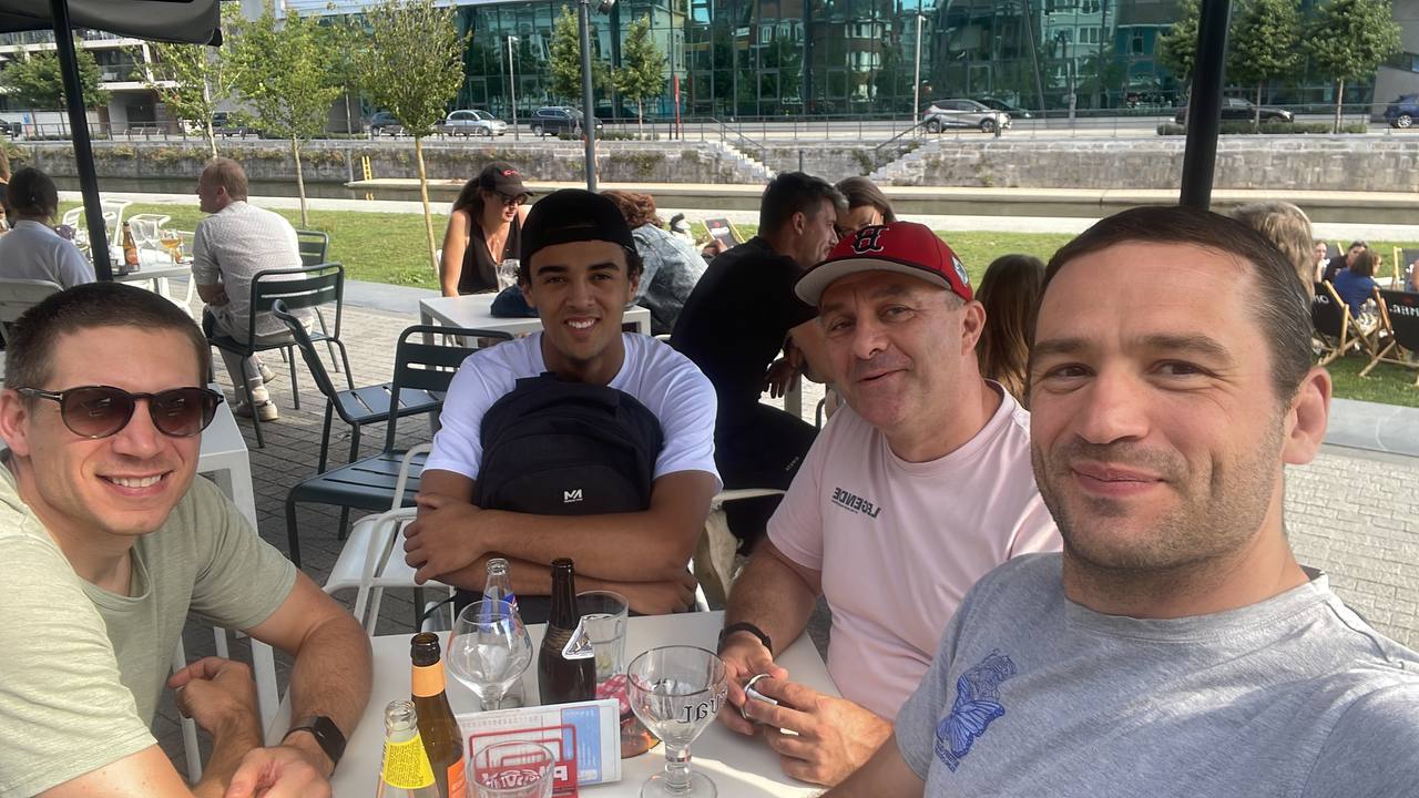 Frederik and old colleagues catching up on a sunny terrace before DrupalCamp Belgium