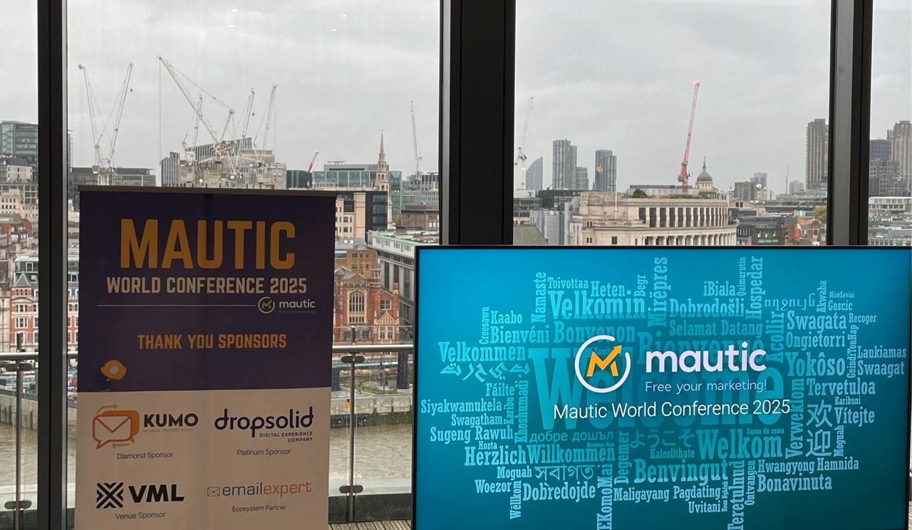 Mautic World Conference 2025 banner with London skyline and sponsors: Dropsolid Platinum Sponsor