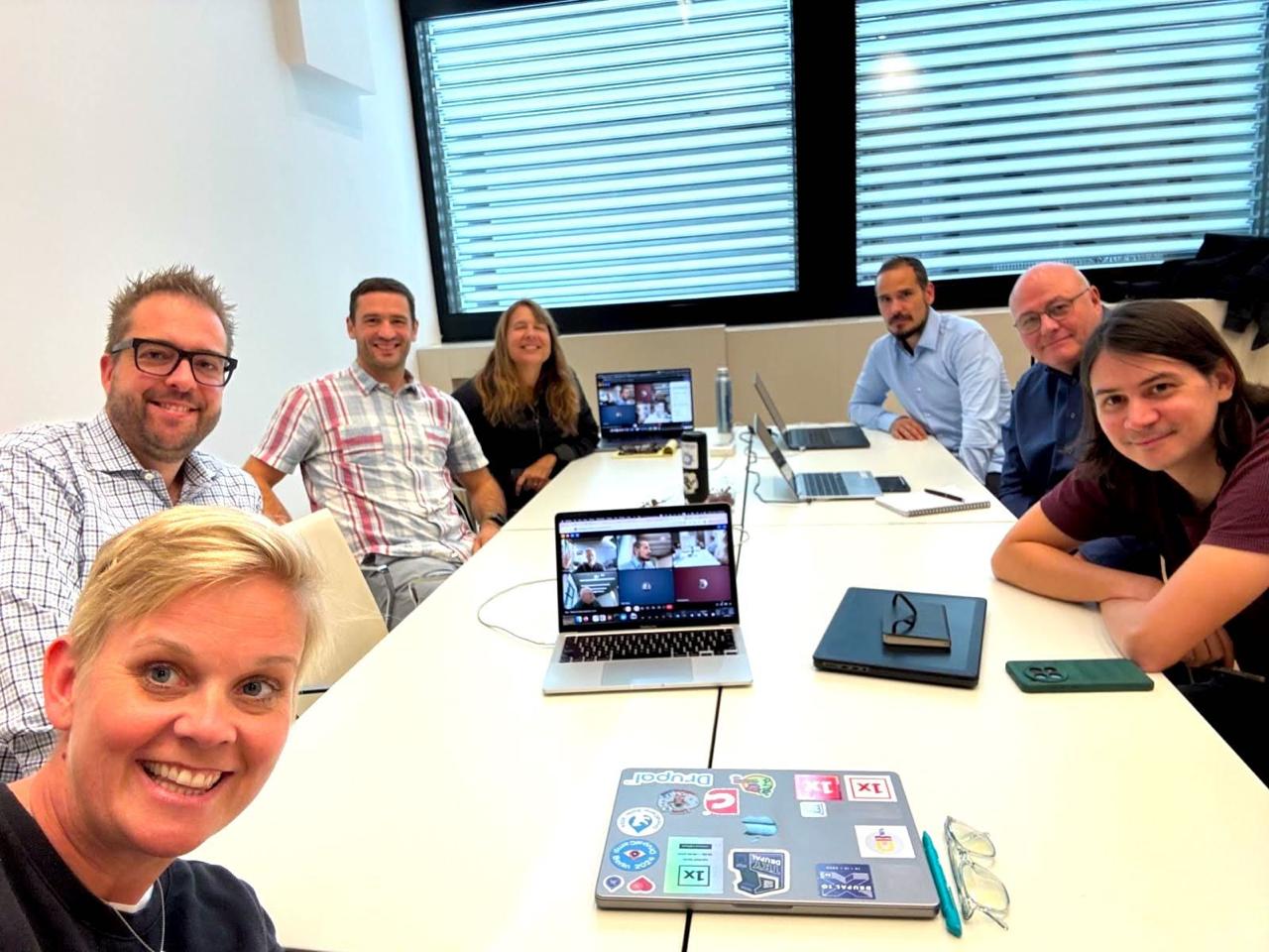 Drupal AI team meeting with remote participants on screen
