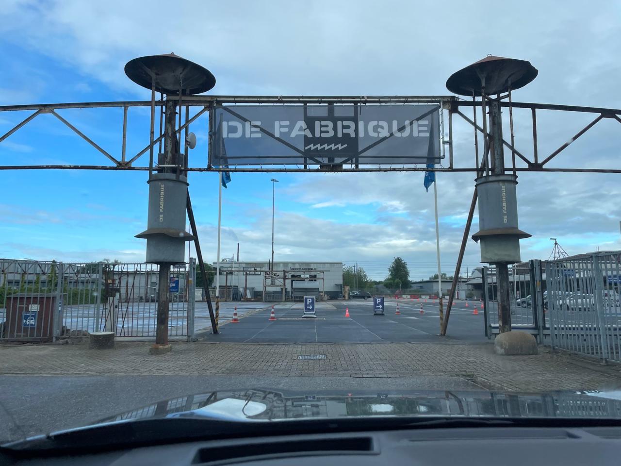 Arriving at De Fabrique Utrecht: industrial gate with the De Fabrique sign, old soap factory turned event venue