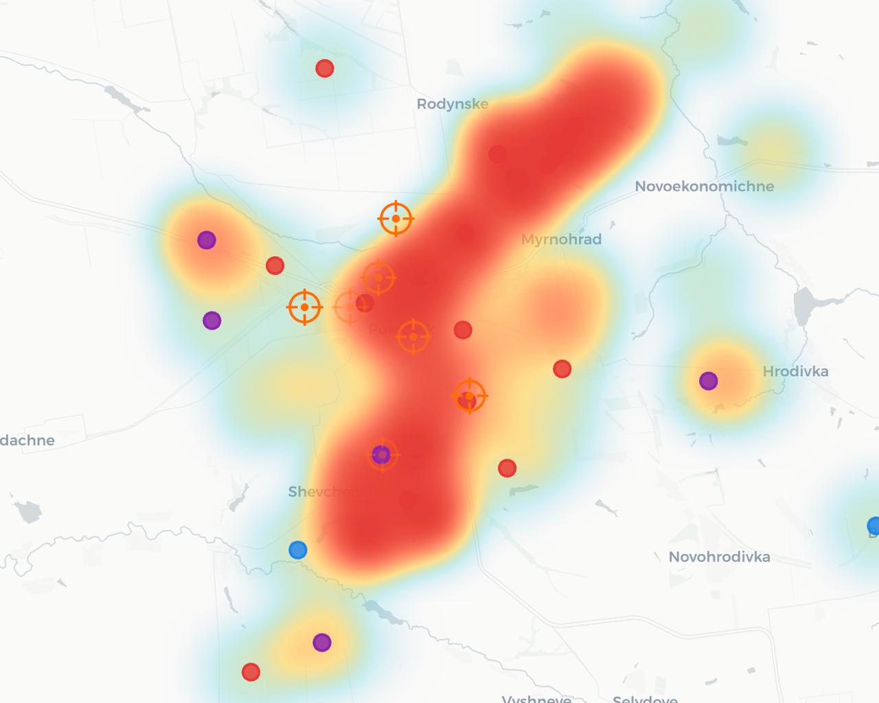RF heatmap showing signal intensity over an area near Myrnohrad and Shevchenko in Ukraine, with red hotspots indicating high signal density and orange crosshair markers showing triangulated emitter positions