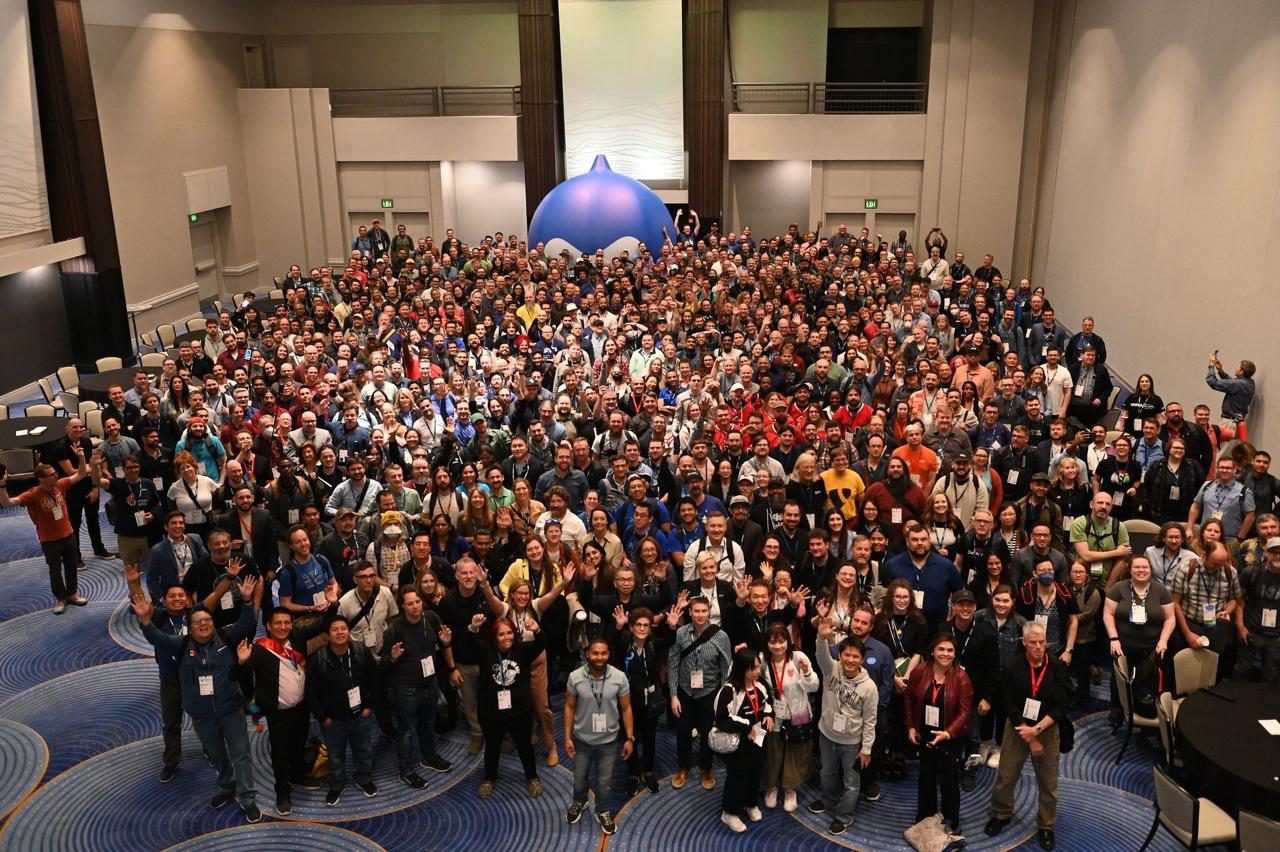 Full DrupalCon Atlanta group photo - hundreds of attendees in front of the giant Drupal drop